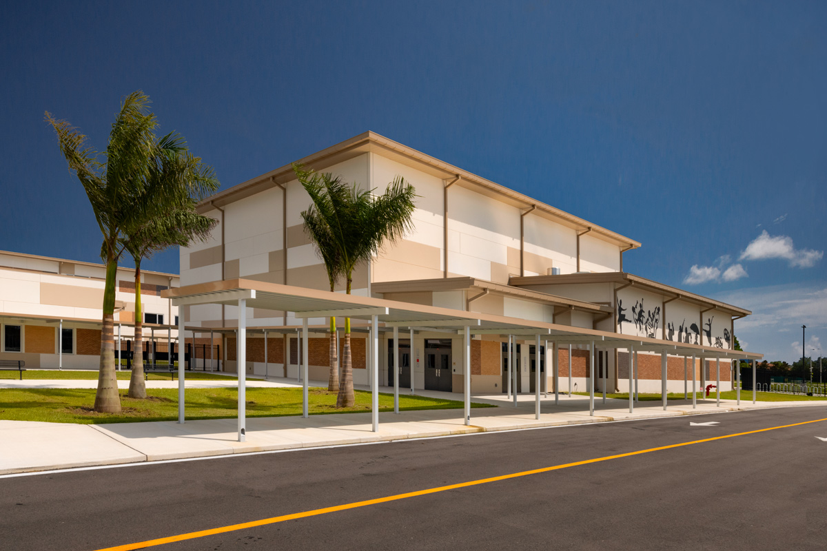 Architectural dusk view of the Gateway High School arts building in Fort Myers, FL.